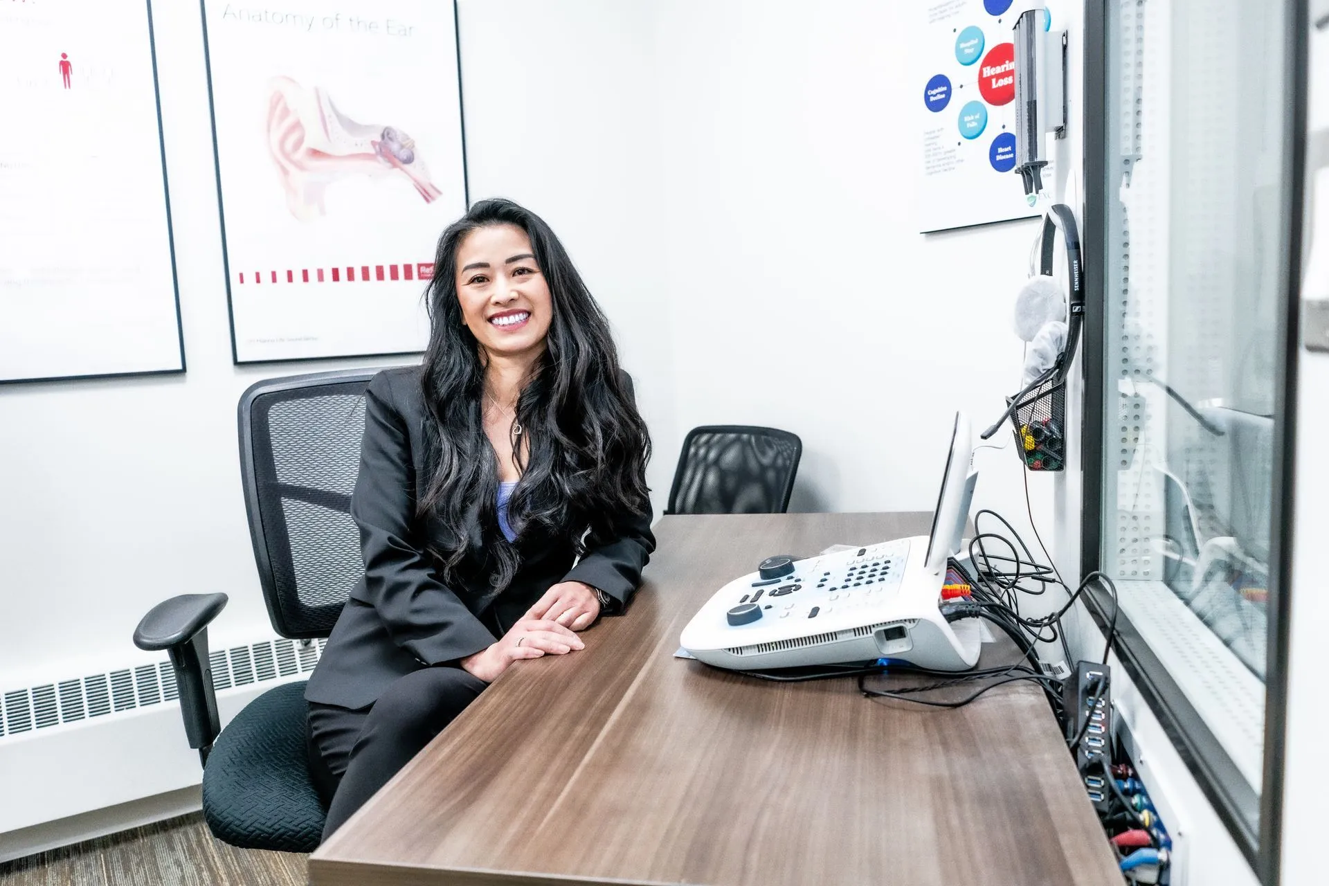 Hearing care professional with a patient at Calgary Ear Centre